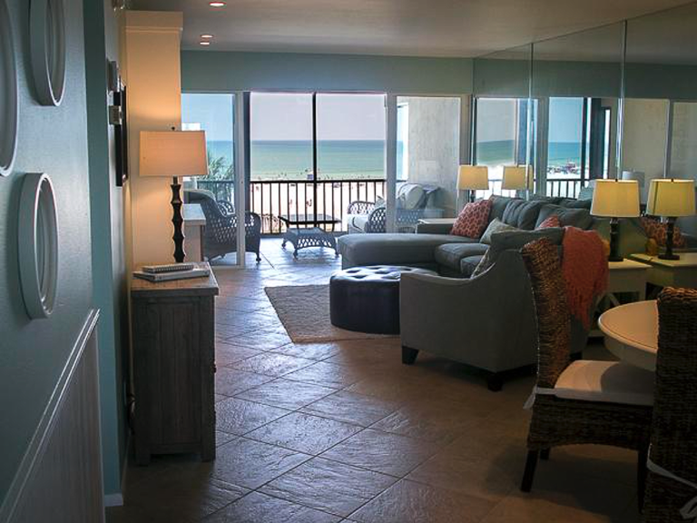 View of living room and Lanai with view of Siesta Beach ...